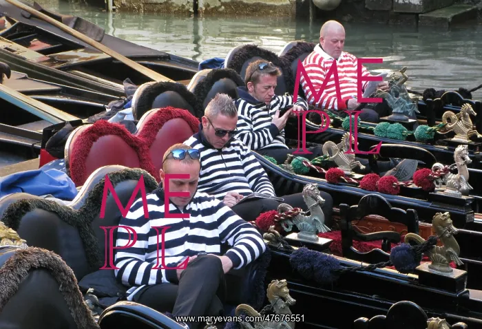 : Four gondoliers in their gondolas behind St Mark's, Venice : Four gondoliers in their gondolas behind St Mark's, Venice