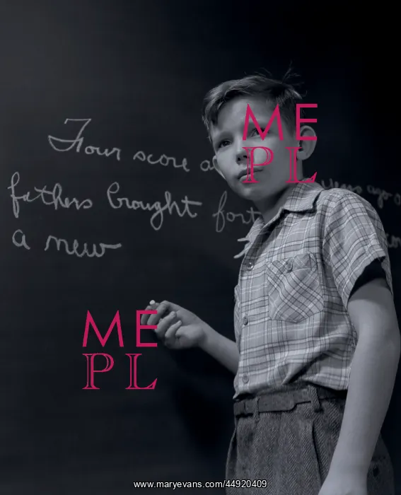 : Grade school boy at chalkboard writing out gettysburg : Grade school boy at chalkboard writing out gettysburg