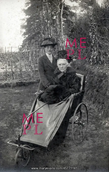 : Grand-looking elderly lady going out in her bath chair : Grand-looking elderly lady going out in her bath chair