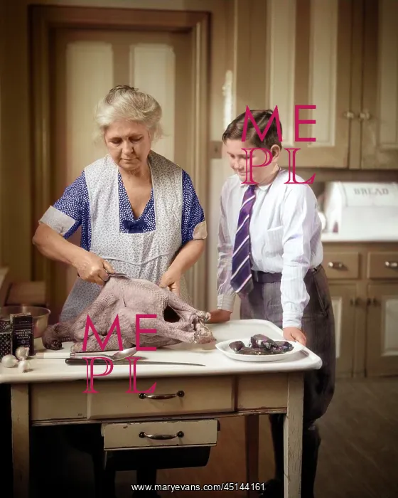 : Grandmother in Apron Preparing a Turkey in the : Grandmother in Apron Preparing a Turkey in the
