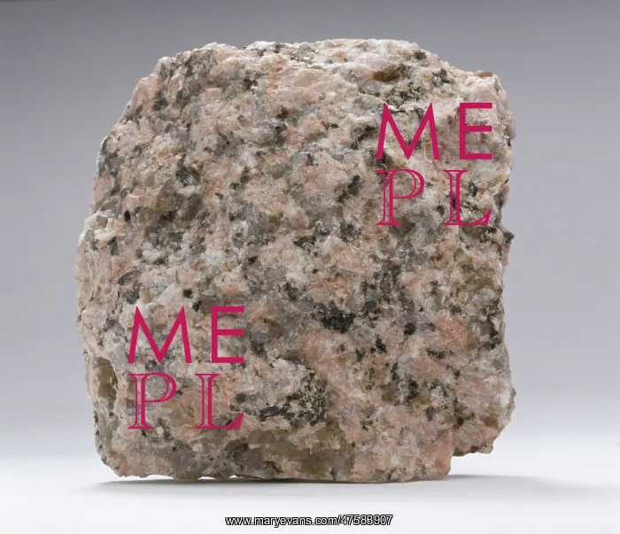 : Granite. The different minerals in granite are shown by the various colours - white : Granite. The different minerals in granite are shown by the various colours - white