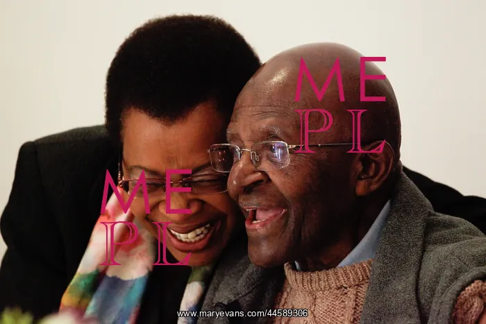 : Grasa Machel and Desmond Tutu share a laugh together : Grasa Machel and Desmond Tutu share a laugh together