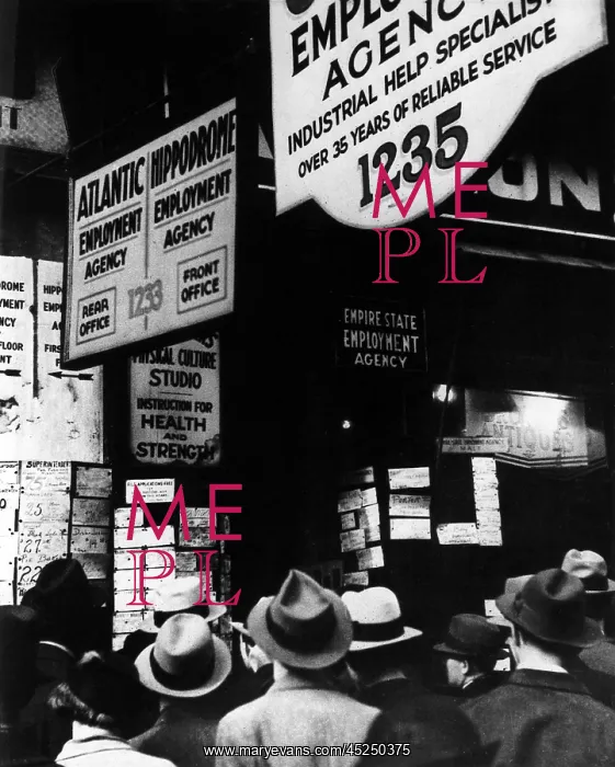 : The Great Depression. Unemployed men crowd around : The Great Depression. Unemployed men crowd around