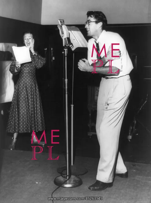 : Gregory Peck at microphone with Kay Brinker in : Gregory Peck at microphone with Kay Brinker in