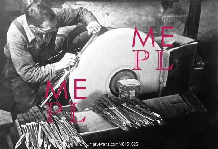 : Grinding of bayonets in Solingen, 1940 : Grinding of bayonets in Solingen, 1940