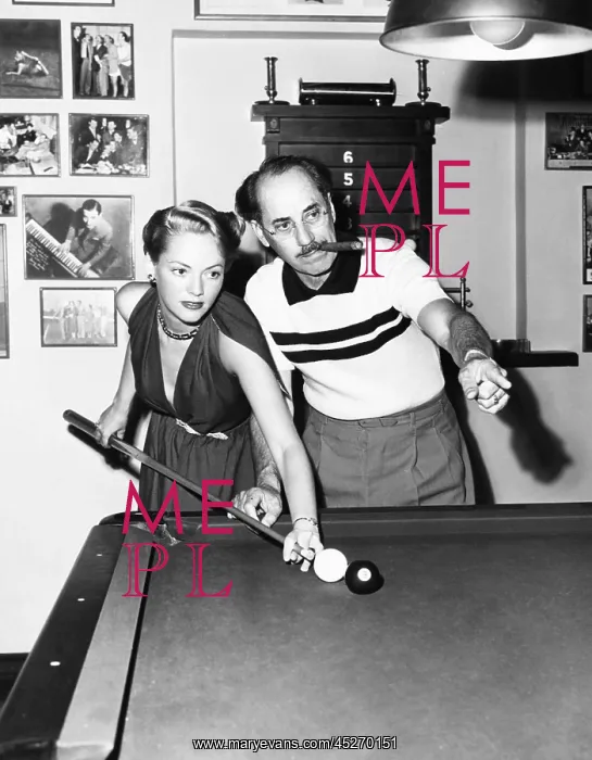 : Groucho Marx at home playing billiards with his : Groucho Marx at home playing billiards with his