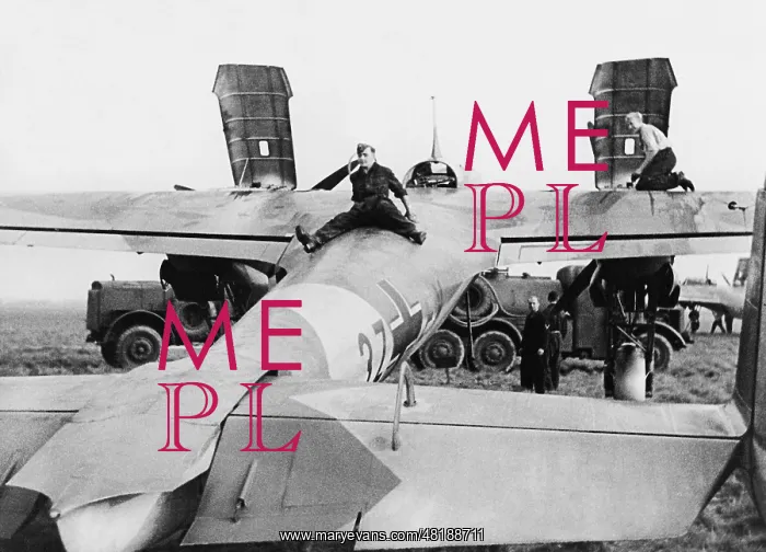 : Ground Staff Check a Plane on the Eastern Front, 1941 : Ground Staff Check a Plane on the Eastern Front, 1941