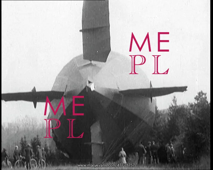 : A Grounded Zeppelin Airship With People Crowding : A Grounded Zeppelin Airship With People Crowding