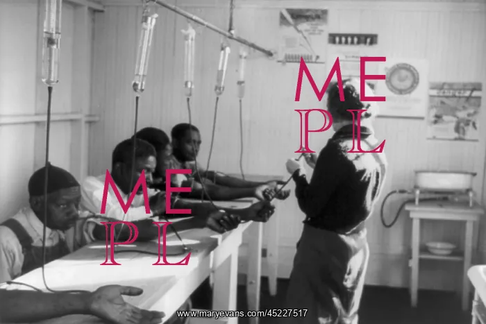 : A group of African American men receiving ? : A group of African American men receiving ?