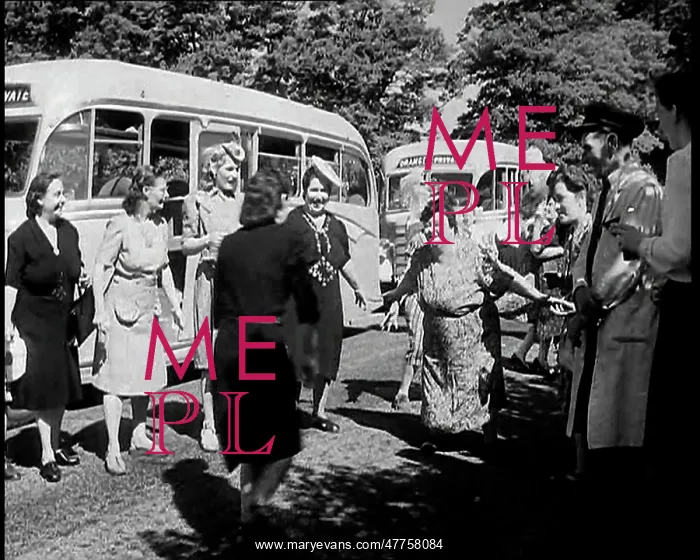 : A Group of British Women Dancing on a Grass : A Group of British Women Dancing on a Grass