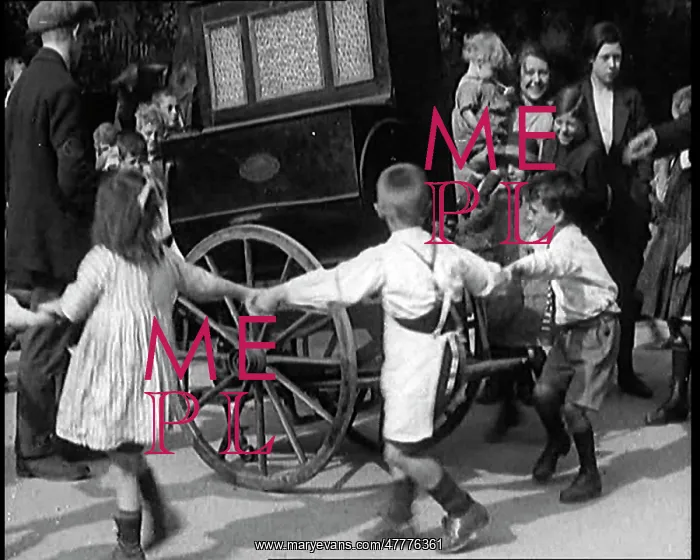 : A Group Of Civilian Children Dancing Around : A Group Of Civilian Children Dancing Around