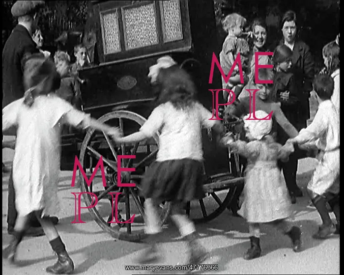 : A Group Of Civilian Children Dancing Around : A Group Of Civilian Children Dancing Around