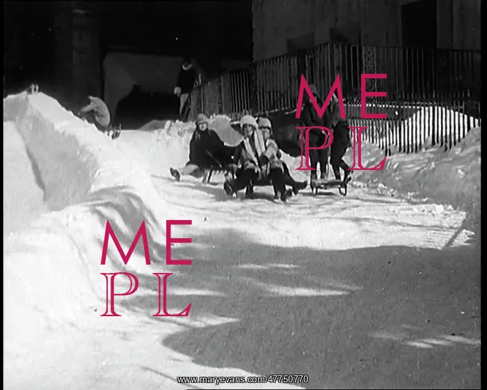 : A Group Of Civilians Having Fun Sledging Down : A Group Of Civilians Having Fun Sledging Down