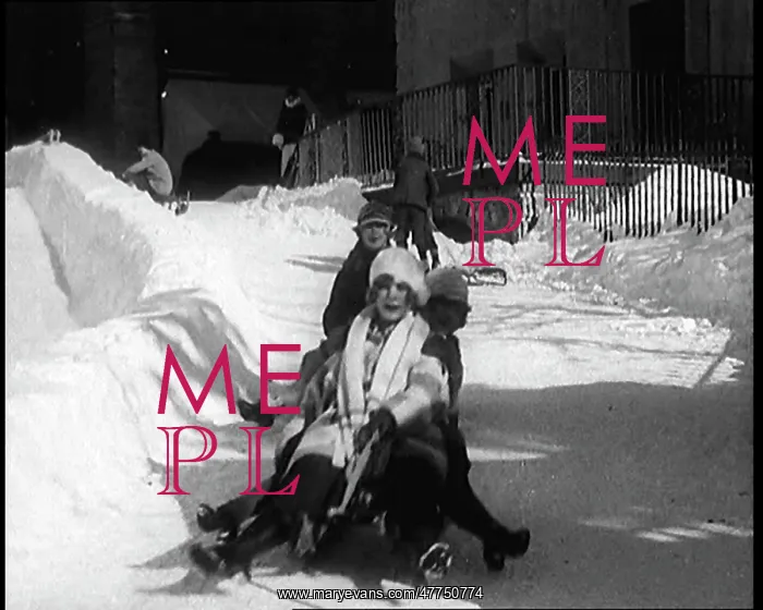 : A Group Of Civilians Having Fun Sledging Down : A Group Of Civilians Having Fun Sledging Down