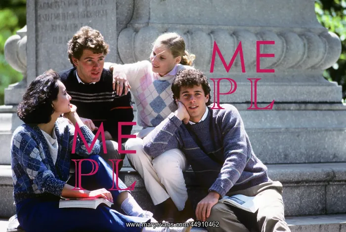 : Group of Four College Students Hanging Out on Campus : Group of Four College Students Hanging Out on Campus