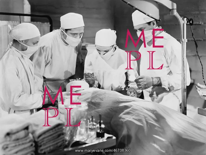 : Group of doctors performing surgery : Group of doctors performing surgery