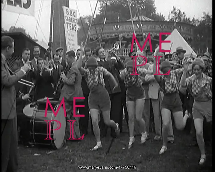 : A Group of Female Civilians Dancing Outside : A Group of Female Civilians Dancing Outside