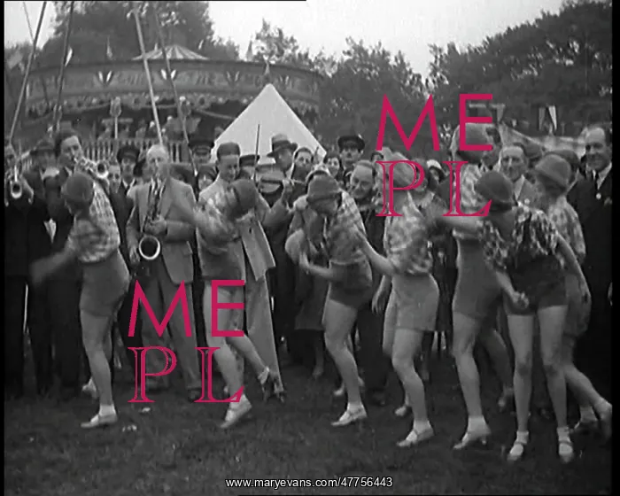: A Group of Female Civilians Dancing Outside : A Group of Female Civilians Dancing Outside