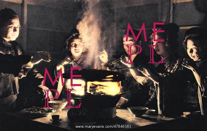 : A group of Japanese people enjoying a meal : A group of Japanese people enjoying a meal