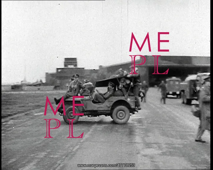 : A Group of Male Pilots Riding On Top of a Jeep : A Group of Male Pilots Riding On Top of a Jeep