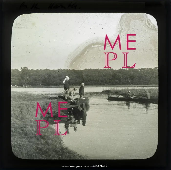  : Group of men boating on a lake