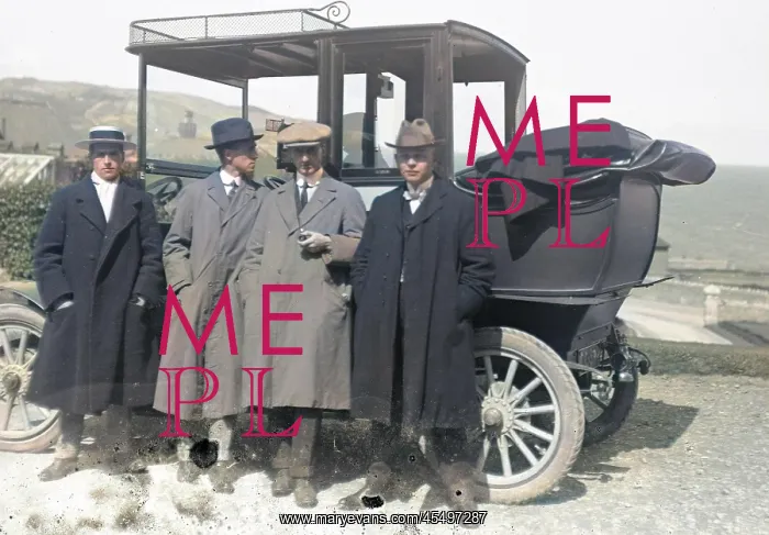 : Group of men by a car : Group of men by a car