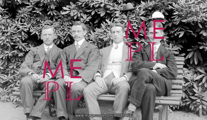 : Group of four men with hats : Group of four men with hats
