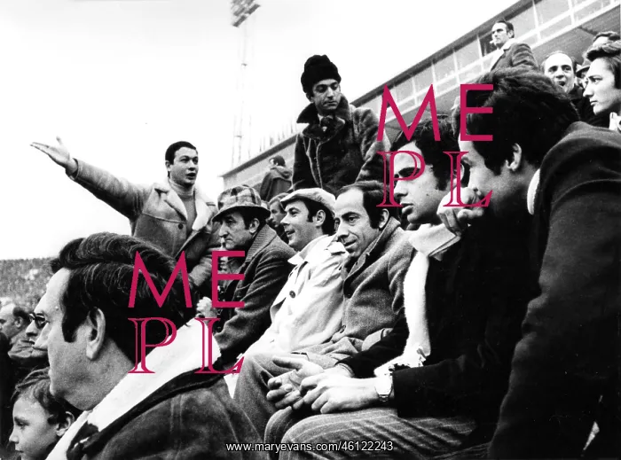 : Group of men in sports stadium : Group of men in sports stadium
