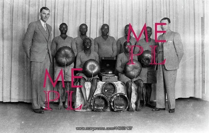 : The group of musicians that Hugh Tracey took either : The group of musicians that Hugh Tracey took either