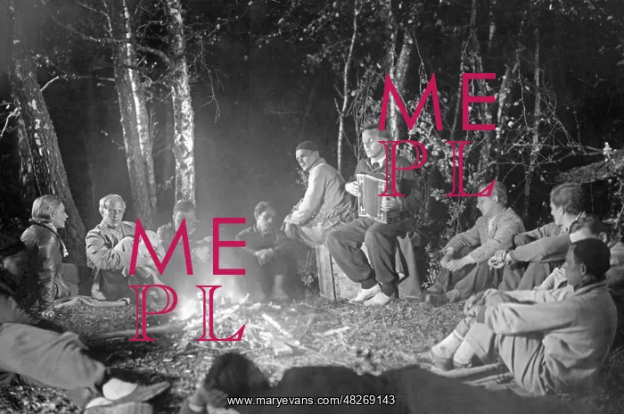 : Group of people around the camp fire, 1920s : Group of people around the camp fire, 1920s
