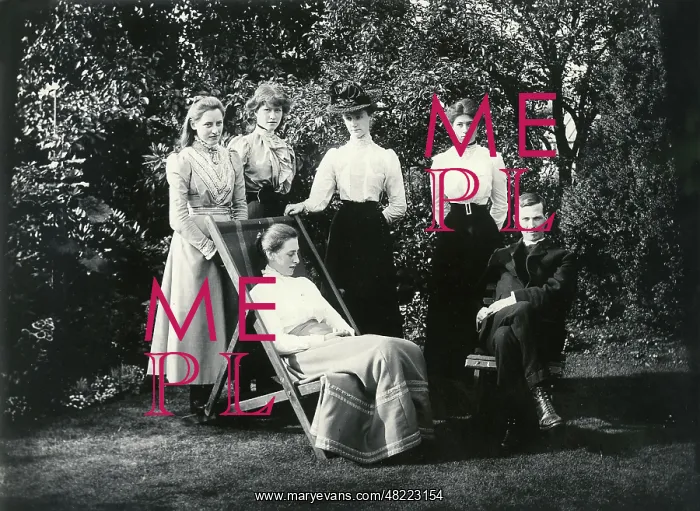 : Group of people in a garden : Group of people in a garden