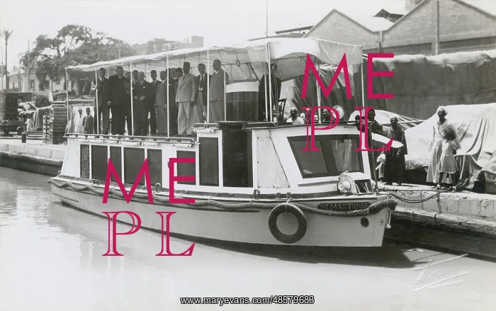 : Group of people on motor boat named St. Martinus : Group of people on motor boat named St. Martinus