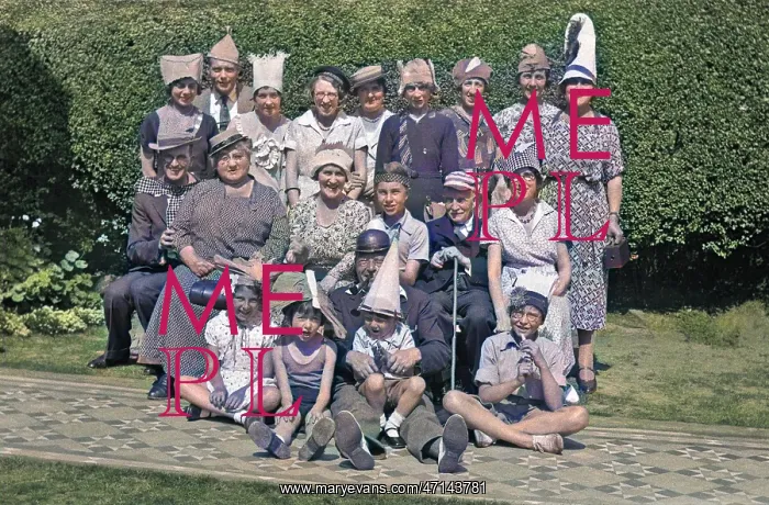 : Group of people in party hats : Group of people in party hats