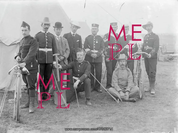 : Group of soldiers and civilians at a training camp : Group of soldiers and civilians at a training camp