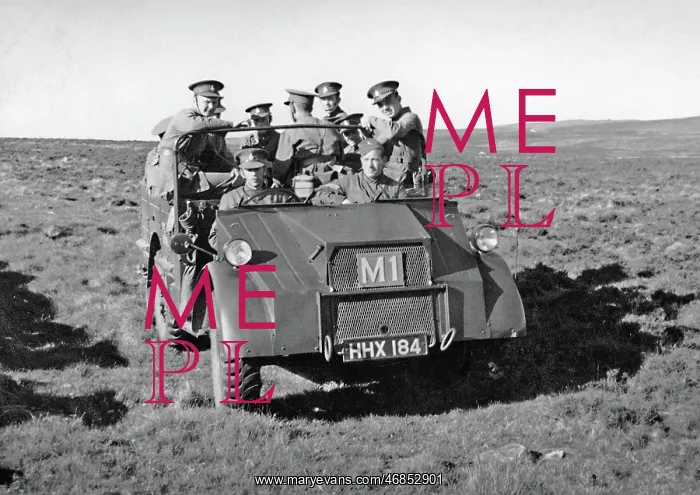: Group of soldiers in a jeep : Group of soldiers in a jeep