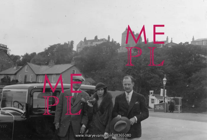 : A group standing in front of their car in Filey : A group standing in front of their car in Filey