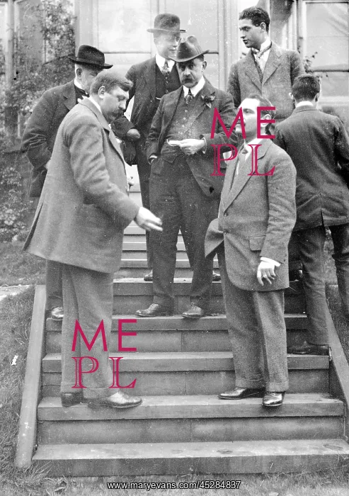 : Group on steps at house : Group on steps at house