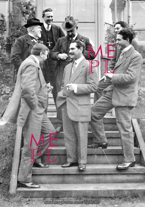  : Group on steps at house