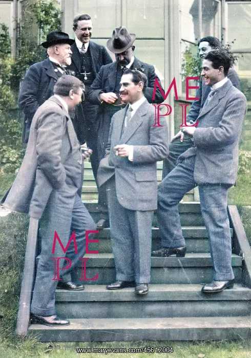  : Group on steps at house
