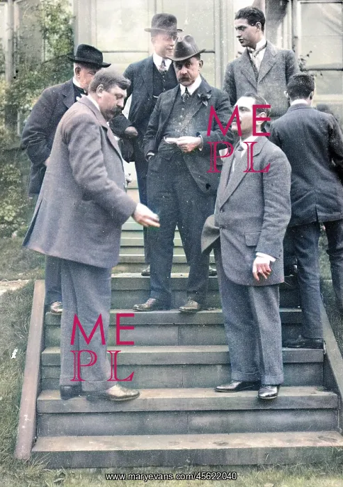  : Group on steps at house