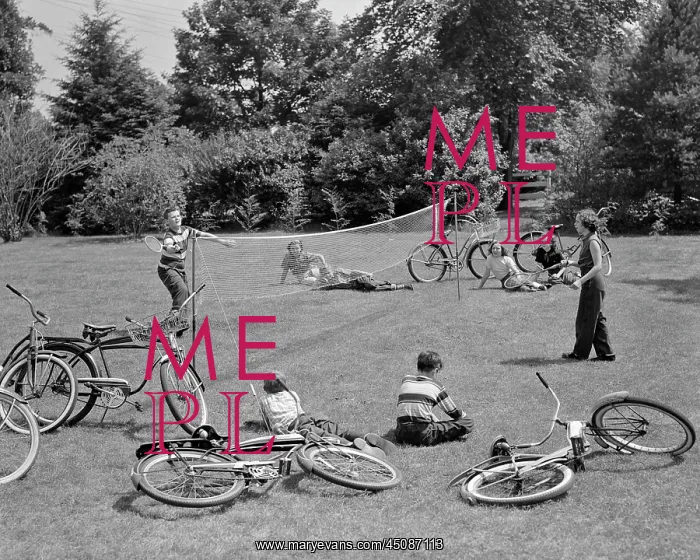 : Group of Teens Lying in Grass with Bicycles Boy : Group of Teens Lying in Grass with Bicycles Boy
