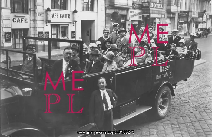 : A group of tourists on a guided tour of Berlin in the 30s : A group of tourists on a guided tour of Berlin in the 30s