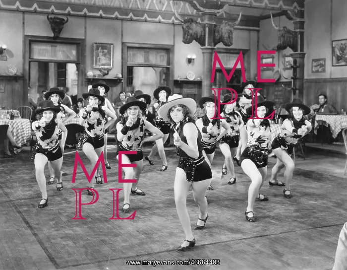 : A group of women dancing : A group of women dancing