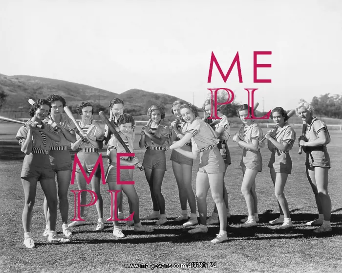 : Group of women holding baseball bats and standing in a row : Group of women holding baseball bats and standing in a row