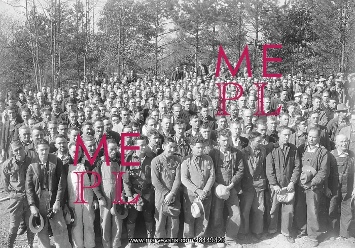 : A group of several hundred workers during : A group of several hundred workers during
