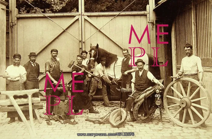 : Group of workers in a blacksmith workshop : Group of workers in a blacksmith workshop