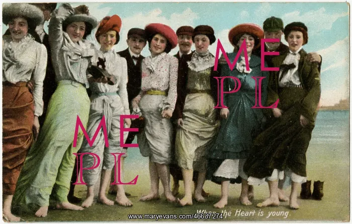 : A group of young people having fun at the seaside : A group of young people having fun at the seaside