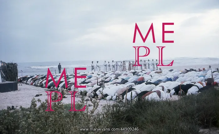 : Groups of Omani elders kneel praying in Oman : Groups of Omani elders kneel praying in Oman
