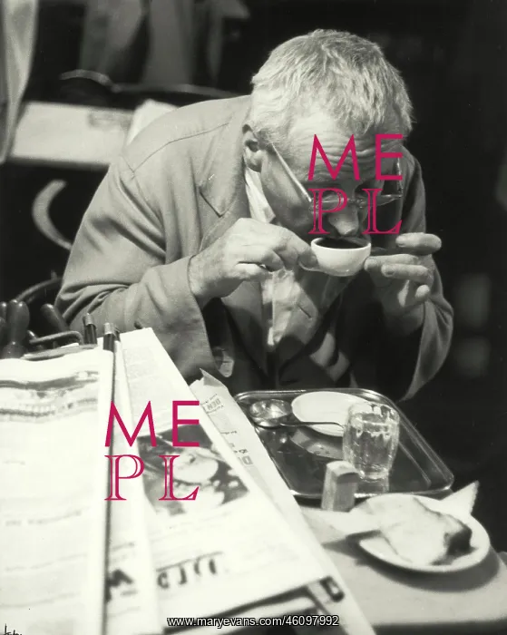 : A guest drinking his coffee. Cafe : A guest drinking his coffee. Cafe