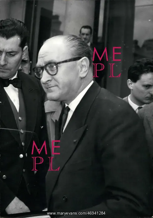 : Guy Mollet leaves Elysee Palace after seeing President Coty : Guy Mollet leaves Elysee Palace after seeing President Coty